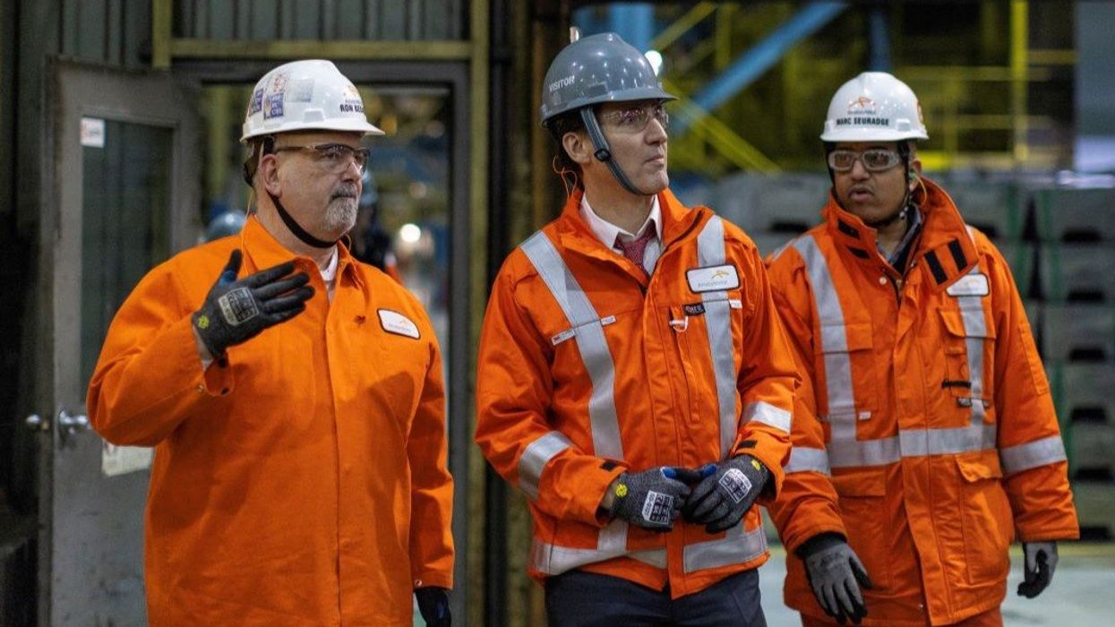 Canadian Prime Minister Justin Trudeau tours the galvanizing line at ArcelorMittal Dofasco in Hamilton, Ontario, Canada February 14, 2025.