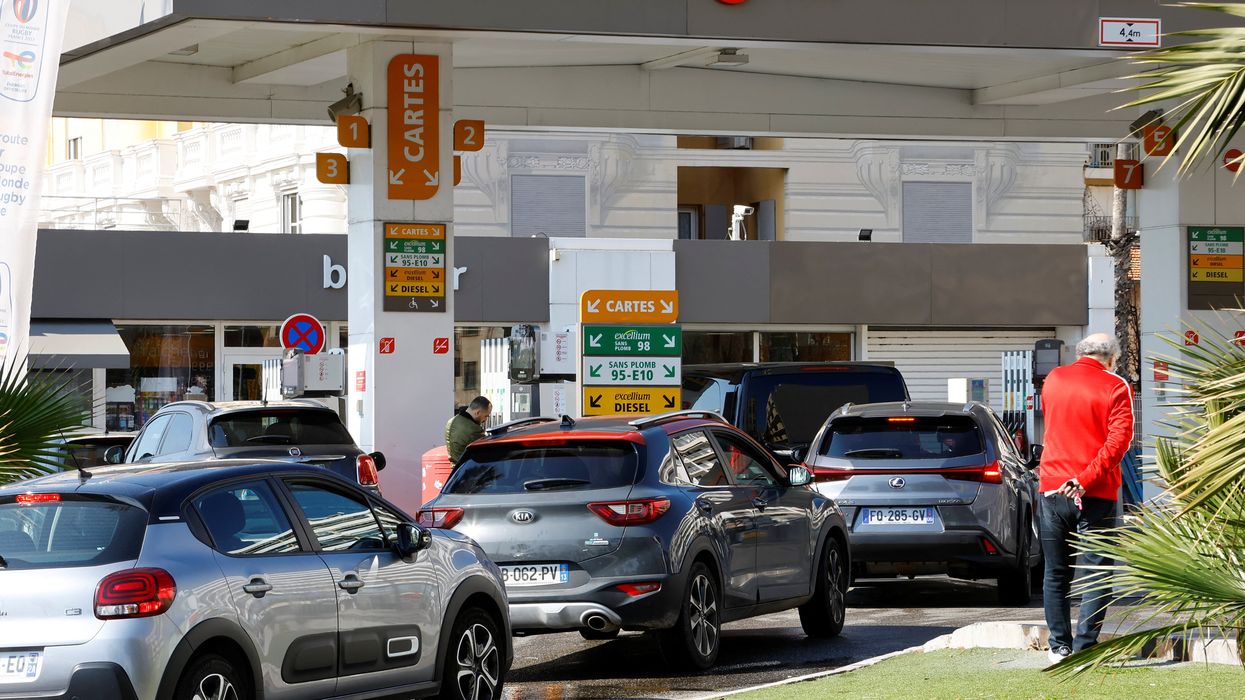 Car drivers queue to fill their fuel tank at a TotalEnergies gas station in Nice as petrol supplies are disrupted by a strike of French refineries and depots, France, March 20, 2023.
