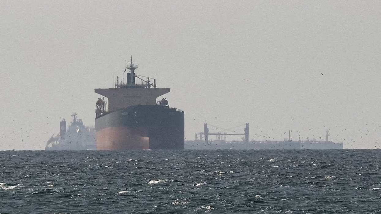 Cargo ships in the Gulf, near the Strait of Hormuz, as seen from northern Ras al-Khaimah, in the United Arab Emirates, on March 11, 2026.