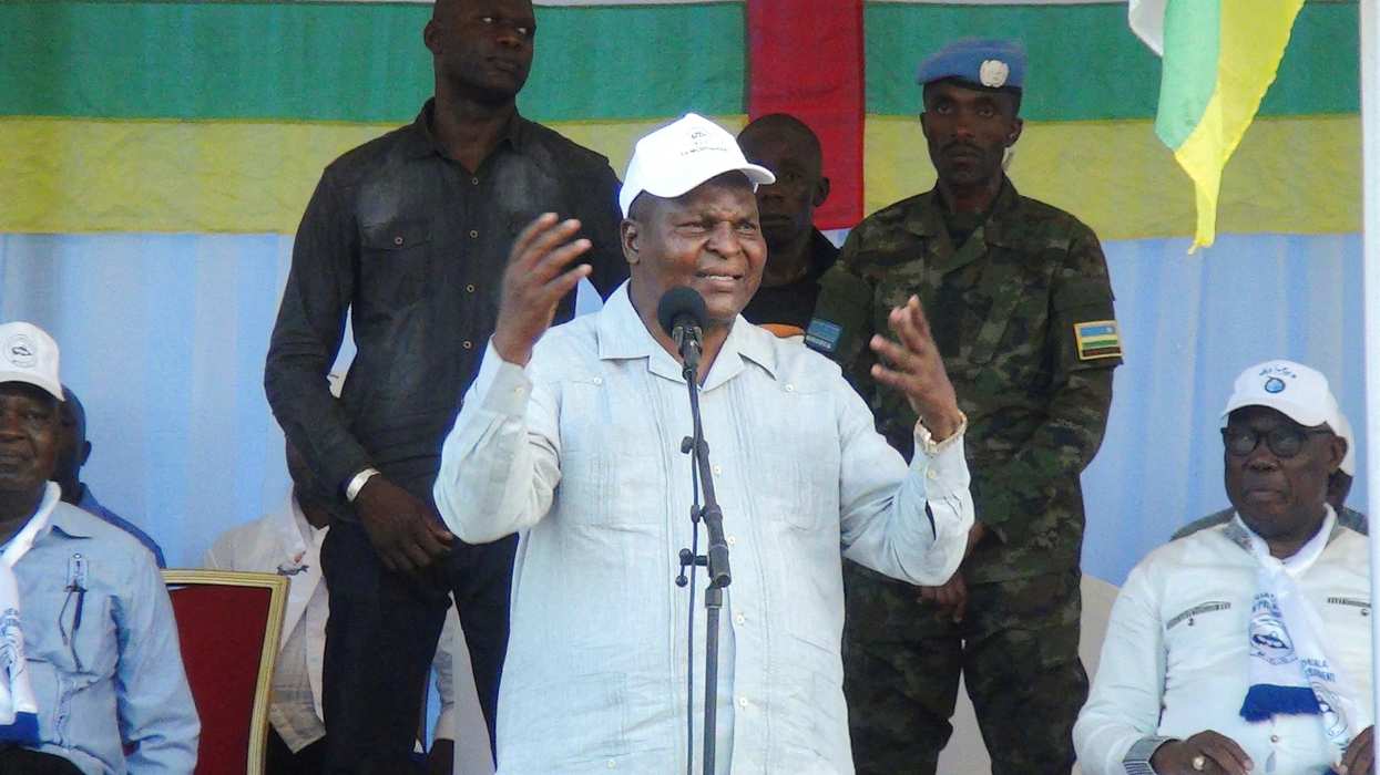 Central African President Faustin-Archange Touadera speaks while surrounded by Russian officers from Wagner Group.