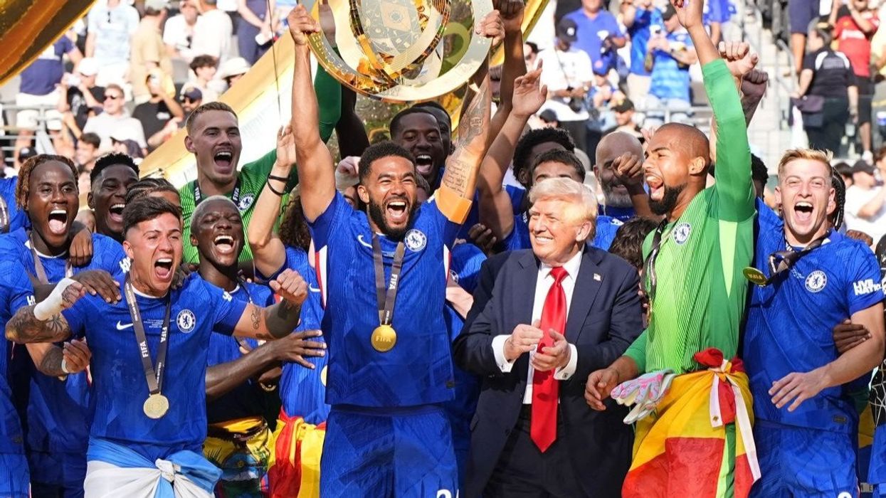 Chelsea players celebrate next to US President Donald Trump after winning the Club World Cup final in East Rutherford, New Jersey, on July 13, 2025.