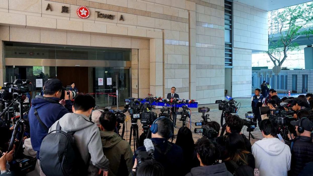 Chief Superintendent of the police force's National Security Department Steve Li Kwai-wah speaks at the West Kowloon Magistrates' Courts building after the verdict in the national security collusion trial of pro-democracy media tycoon Jimmy Lai, in Hong Kong, China, on December 15, 2025.