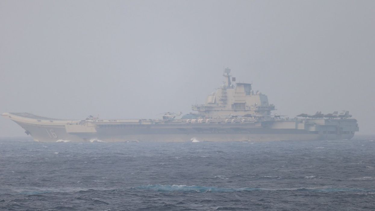 Chinese aircraft carrier Liaoning sails through the Miyako Strait near Okinawa on its way to the Pacific in this handout photo taken by Japan Self-Defense Forces and released by the Joint Staff Office of the Defense Ministry of Japan on April 4, 2021.