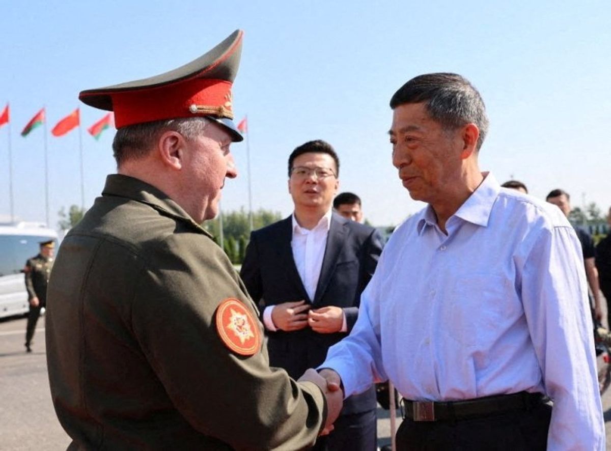 Chinese Defence Minister Li Shangfu is welcomed by Belarusian Defence Minister Viktor Khrenin