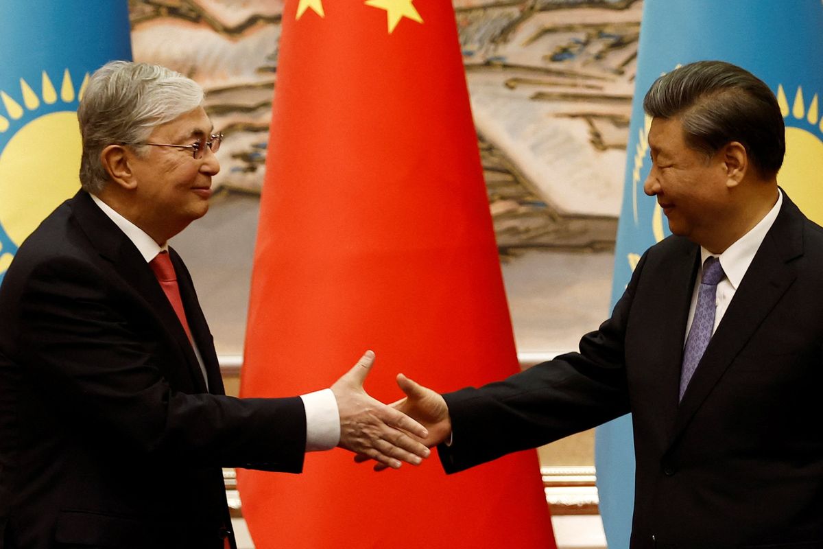 Chinese President Xi Jinping and Kazakhstan's President Kassym-Jomart Tokayev shake hands during a signing ceremony ahead of the China-Central Asia Summit in Xian.