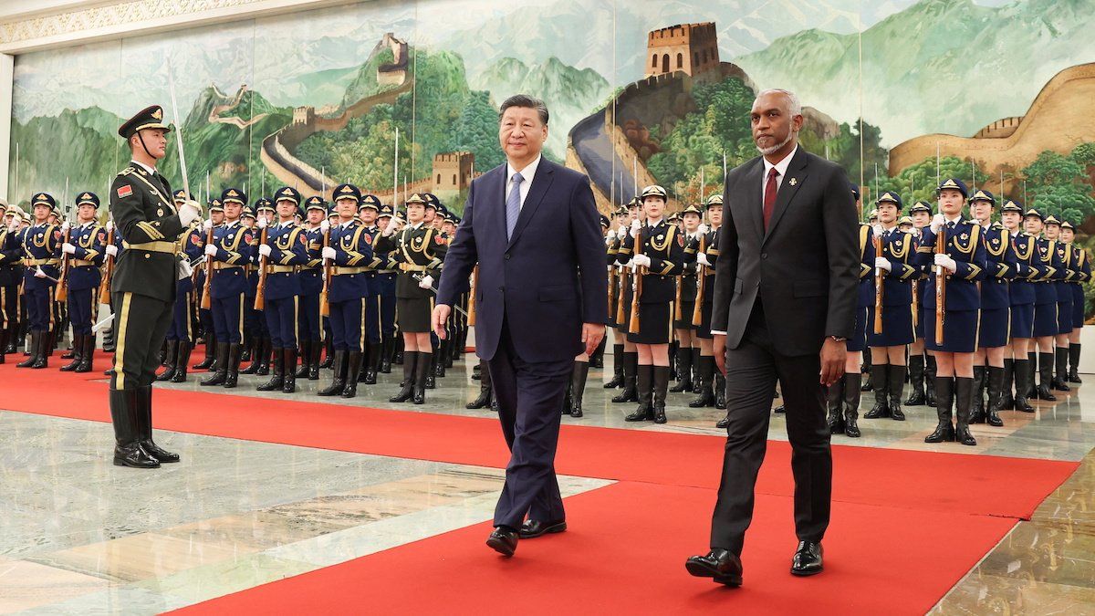 Chinese President Xi Jinping and Maldivian President Mohamed Muizzu attend a welcome ceremony at the Great Hall of the People in Beijing, China January 10, 2024. 