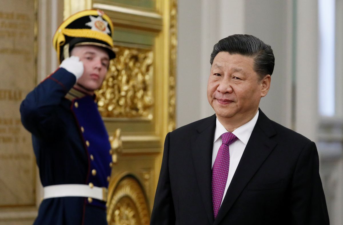Chinese President Xi Jinping arrives for a meeting with Russian President Vladimir Putin at the Kremlin in Moscow.