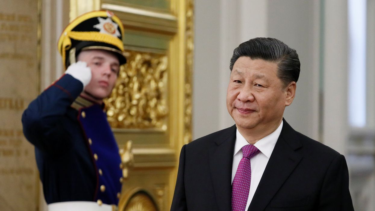 Chinese President Xi Jinping arrives for a meeting with Russian President Vladimir Putin at the Kremlin in Moscow.