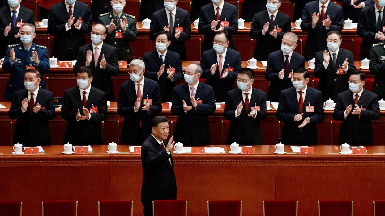 Chinese President Xi Jinping arrives for the opening ceremony of the 20th National Congress of the Communist Party of China in Beijing.