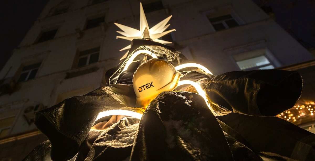 Christmas tree made of the uniforms of electricity grid workers. 