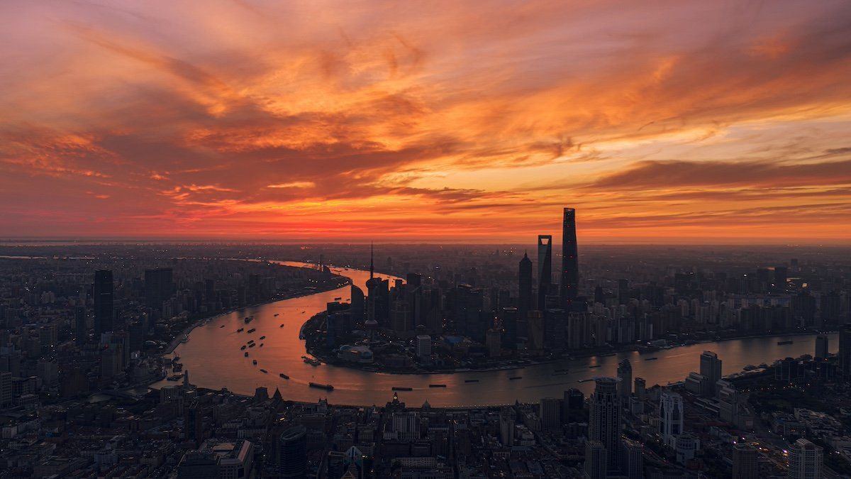 Cityscape of the Lujiazui Financial District in Pudong with the Shanghai Tower, the Shanghai World Financial Center, Jinmao Tower, the Oriental Pearl TV Tower and other skyscrapers and high-rise buildings at sunset in Shanghai, China, 1 August 2019