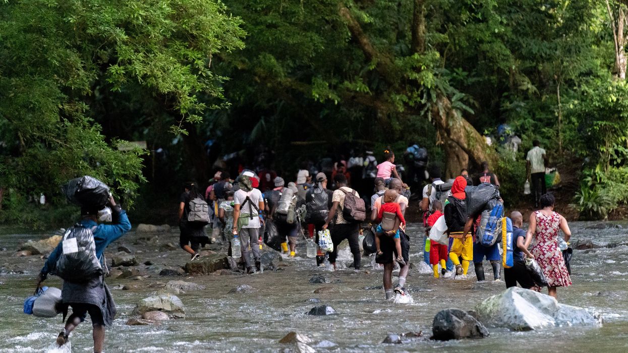 Colombia, Acandi, 2021-10-29. Haitian migrants trek through the Darien Gap towards the border with Panama. Photograph by Yader Guzman / Hans Lucas Colombie, Acandi, 2021-10-29. Des migrants haitiens traversent le Darien Gap en direction de la frontiere avec le Panama.