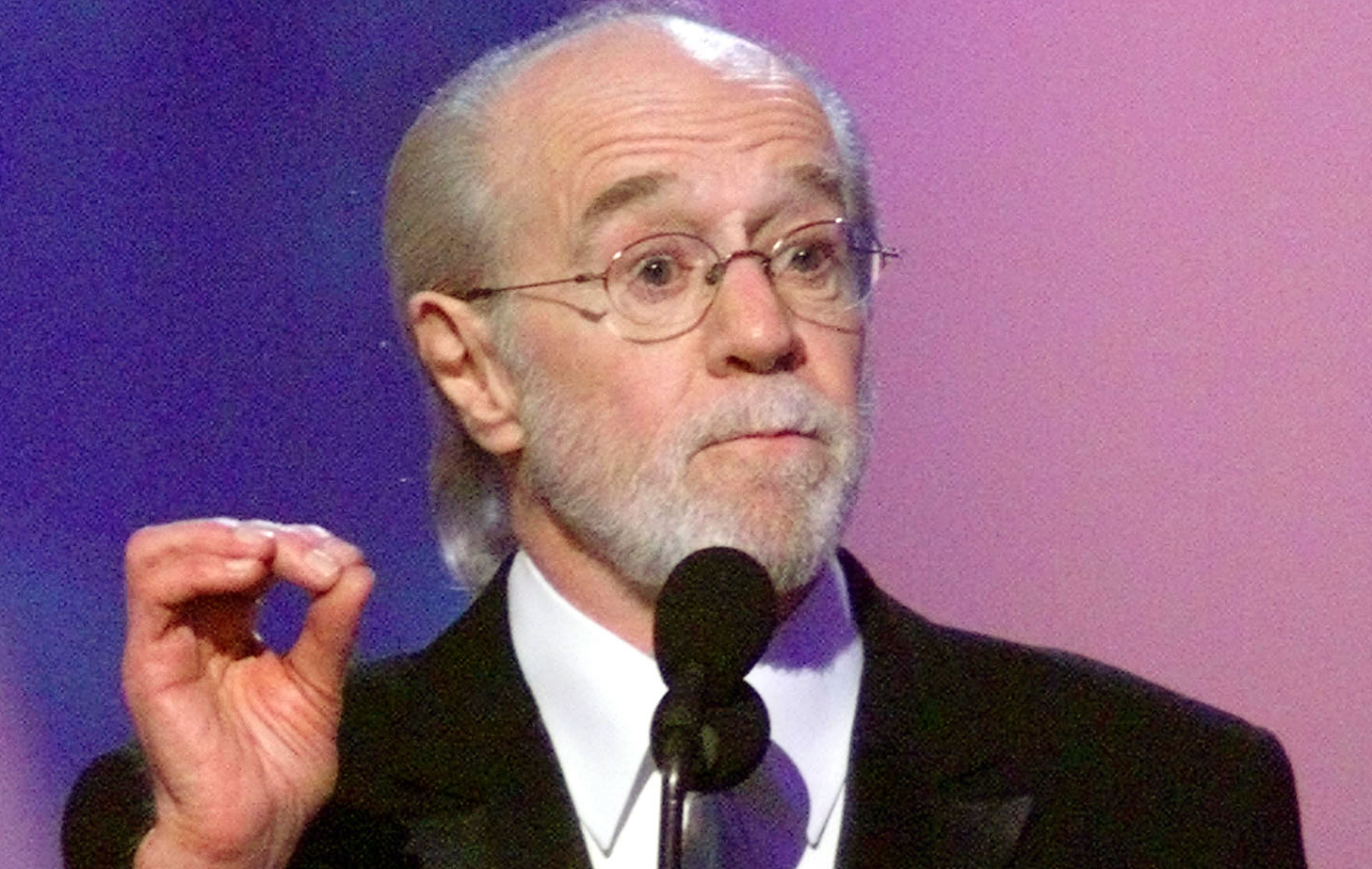 Comedian George Carlin speaks after being presented the Lifetime Achievement Award in 2001 at the 15th annual American Comedy Awards in Los Angeles.