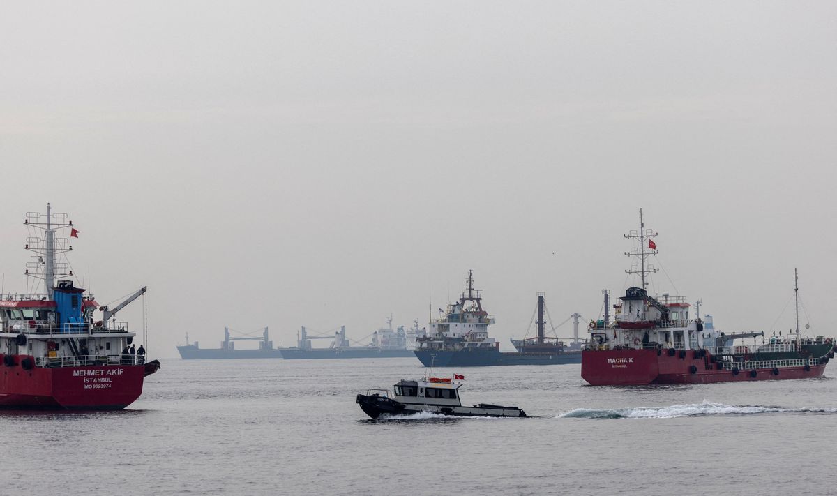 Commercial vessels wait to pass the Bosphorus strait during a misty morning in Istanbul, Turkey, October 31, 2022.