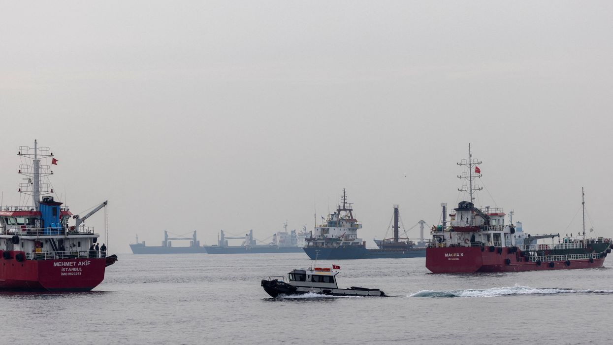 Commercial vessels wait to pass the Bosphorus strait during a misty morning in Istanbul, Turkey, October 31, 2022.