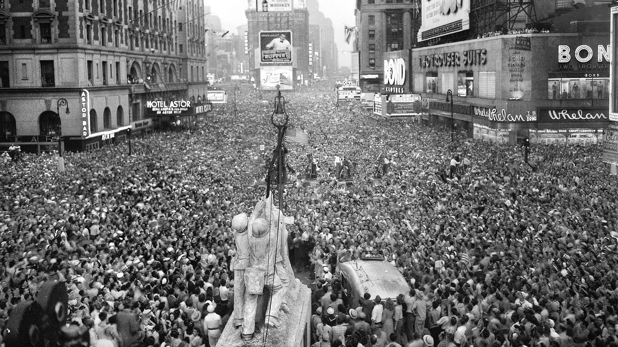 Crowds gather in Times Square to celebrate the surrender of Japan, V-J Day, New York City, New York, USA, U.S. Army Signal Corps, August 15, 1945