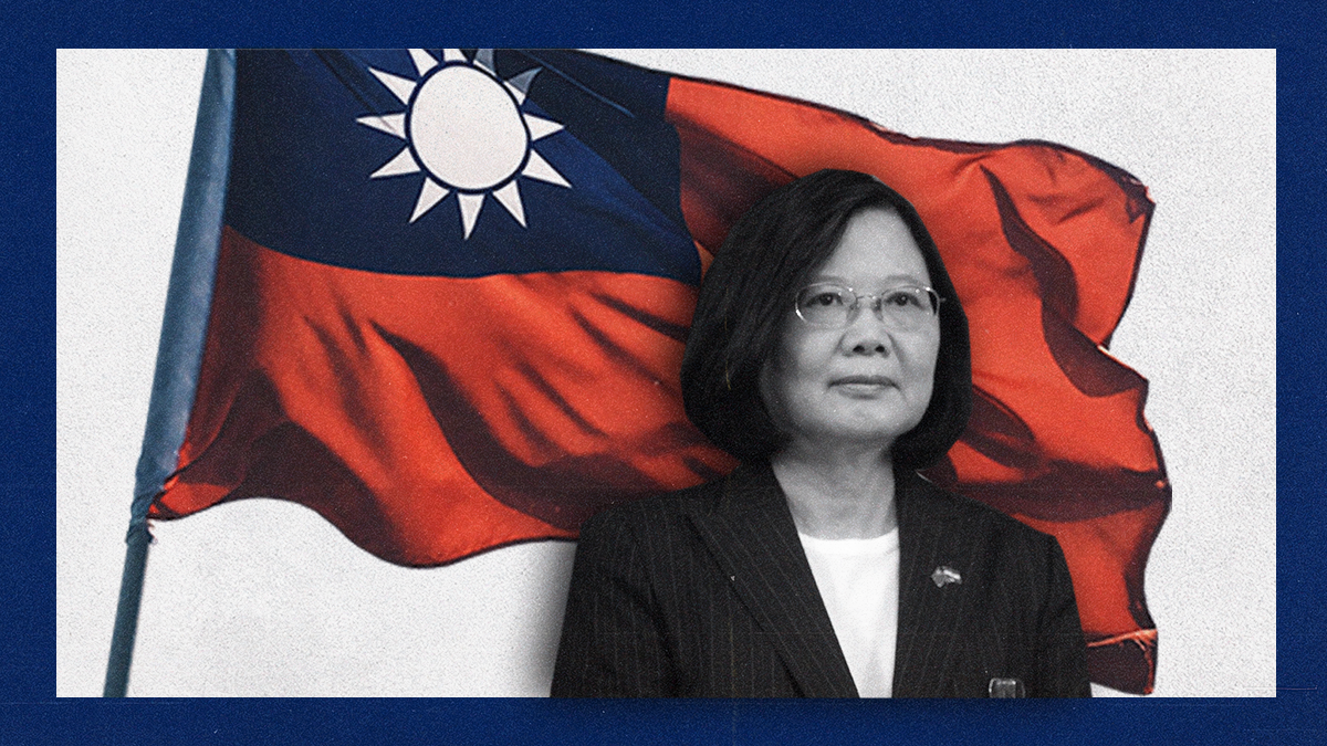 Cutout of Taiwan's President Tsai Ing-wen with a Taiwanese flag in the background