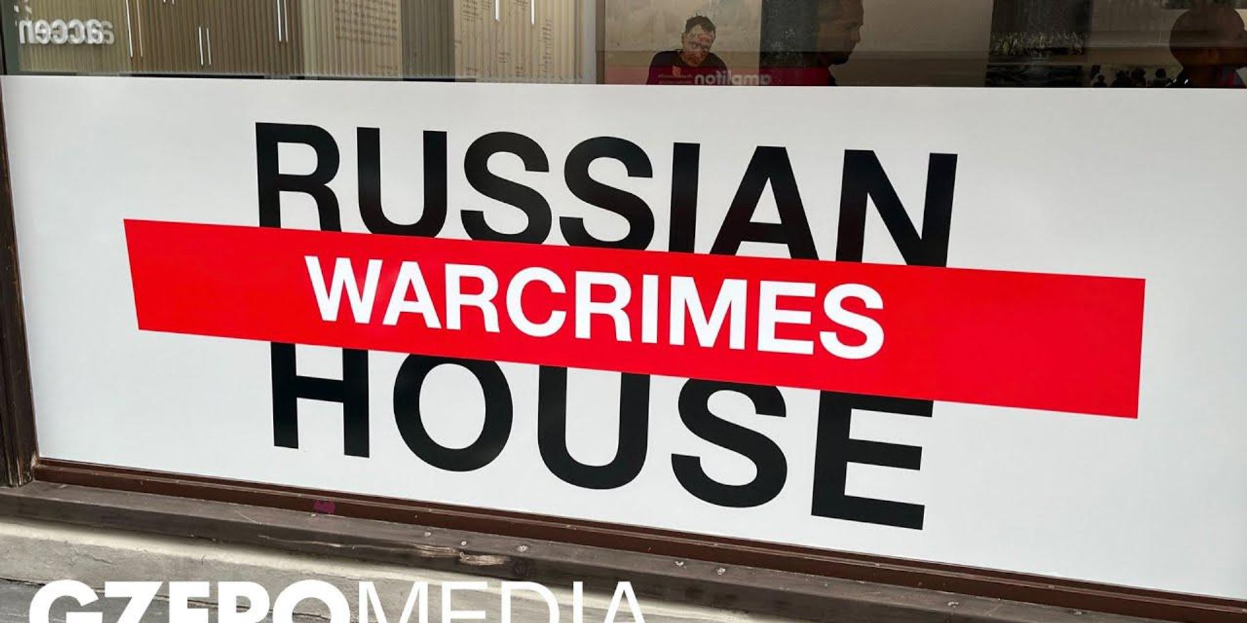 Russian war crimes exhibit at Davos reveals civilian toll in Ukraine