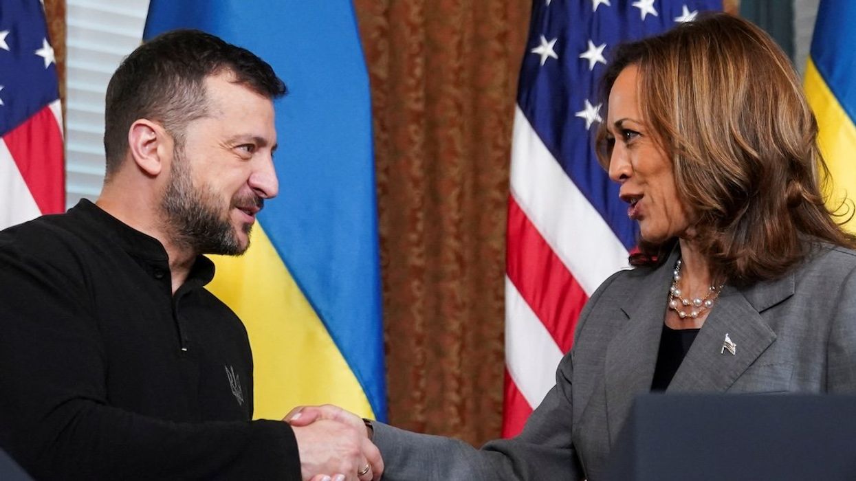 Democratic presidential nominee and U.S. Vice President Kamala Harris shakes hands with Ukraine's President Volodymyr Zelensky, as they meet in the Vice President's Ceremonial Office in the Eisenhower Executive Office Building on the White House campus in Washington, on Sept. 26, 2024.