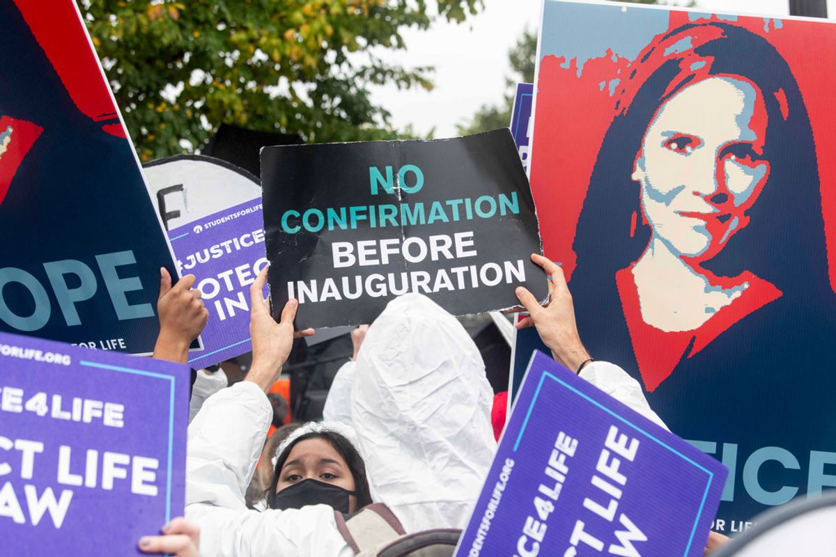 Demonstrators for and against President Trump's Supreme Court nominee Amy Coney Barrett gather outside the US Supreme Court on the first day of Senate confirmation hearings