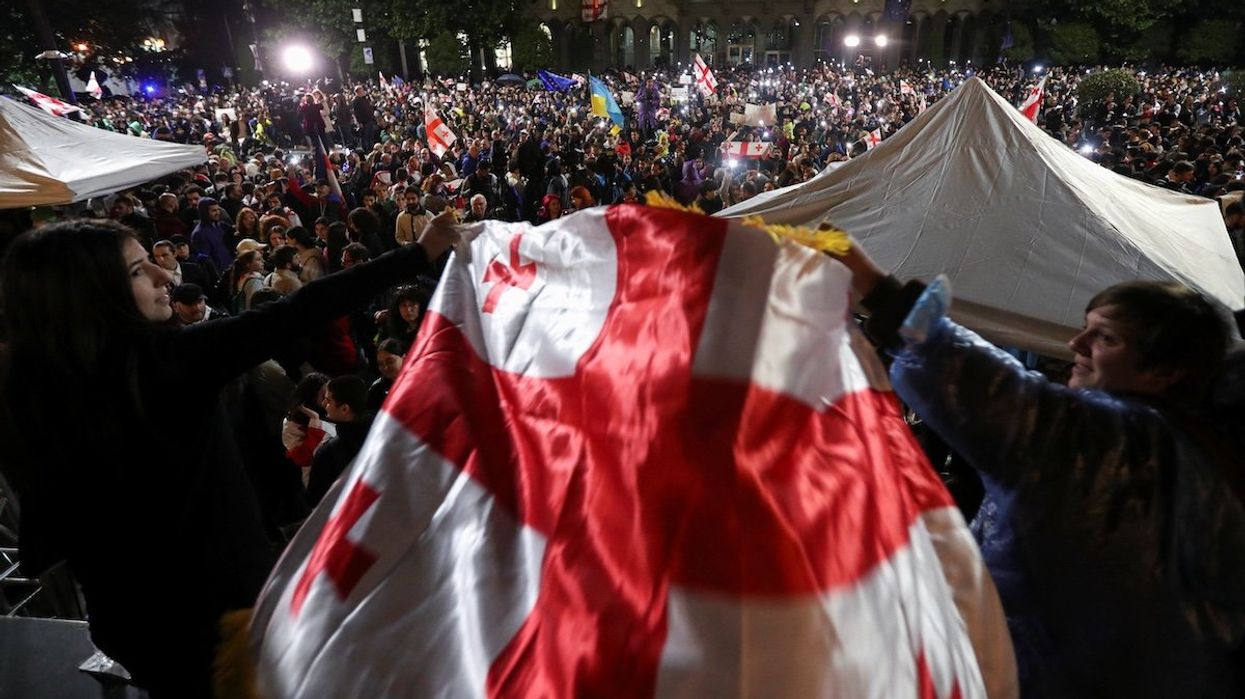 Demonstrators hold a rally to protest against a bill on "foreign agents" in Tbilisi, Georgia, May 13, 2024.