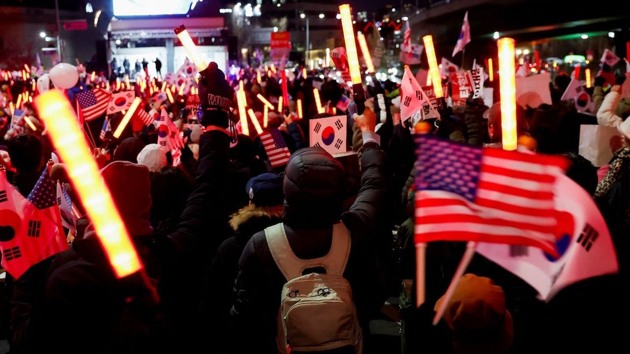 Demonstrators opposing the court's approval of an arrest warrant for impeached South Korean President Yoon Suk Yeol protest outside his official residence in Seoul, South Korea, on Dec. 31, 2024.