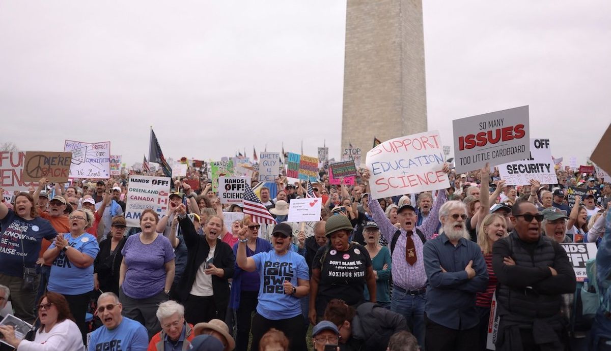 ​Demonstrators rally against President Donald Trump and his adviser Elon Musk during a Hands Off! protest on the Washington Monument grounds in Washington, DC, on April 5, 2025. 
