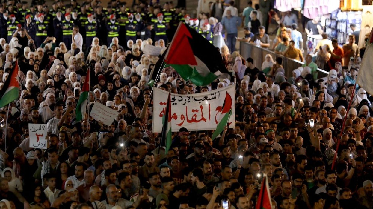 Demonstrators take part in a march in support of Palestinians in Gaza and to salute the slain Jordanian who shot and killed three Israeli civilians, according to the Israeli authorities, at the Allenby Bridge border crossing in the occupied West Bank, in Amman, Jordan September 8, 2024.