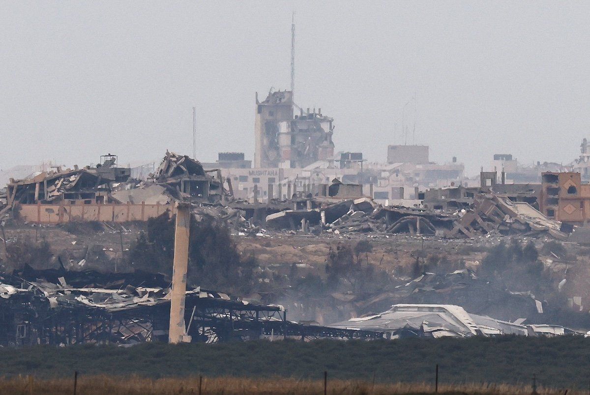 Destroyed buildings lie in ruin in the Gaza Strip, amid the ongoing conflict between Israel and the Palestinian Islamist group Hamas, as seen from southern Israel, December 21, 2023.