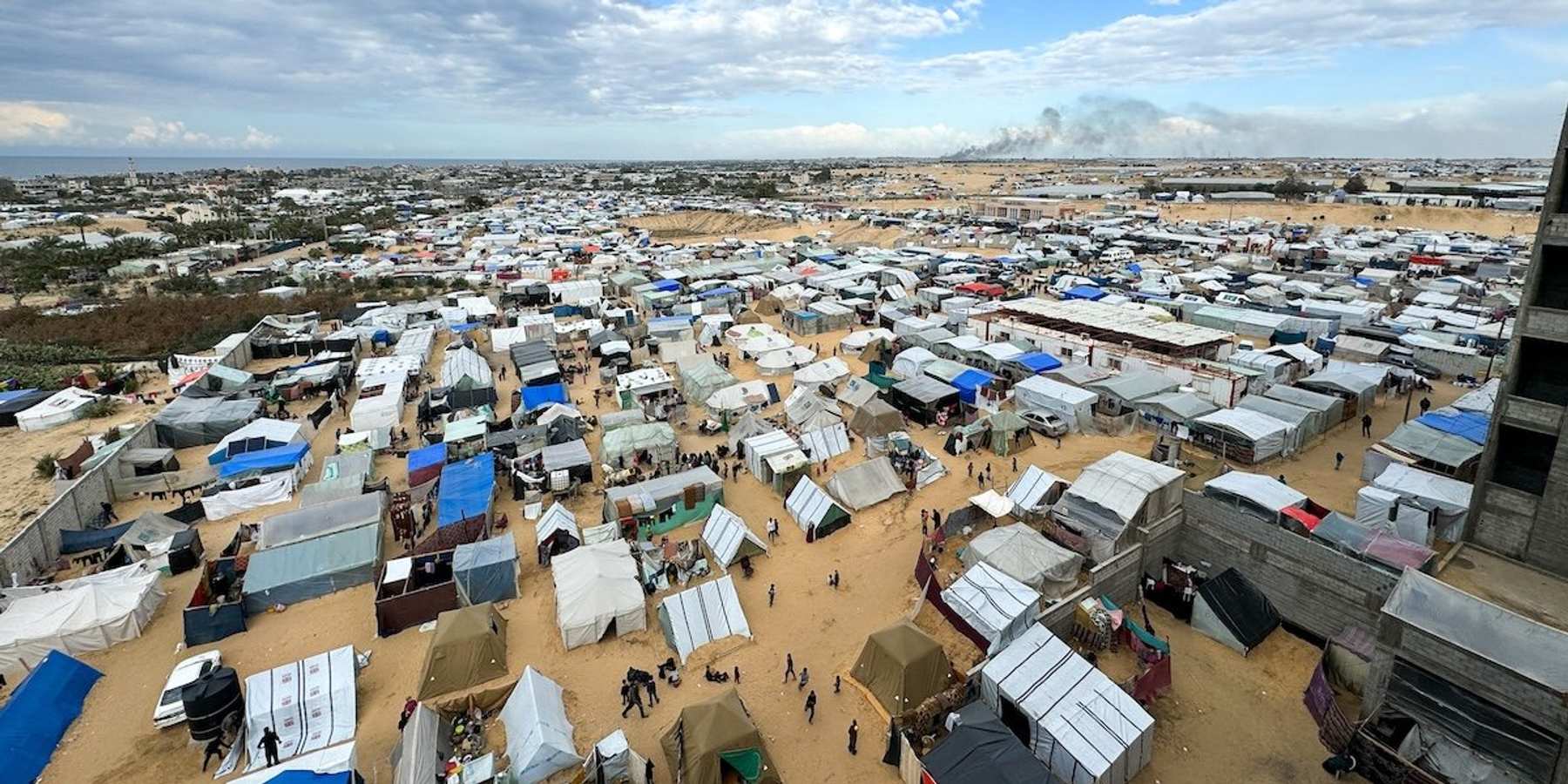Displaced Palestinians take shelter in a tent camp in Rafah.