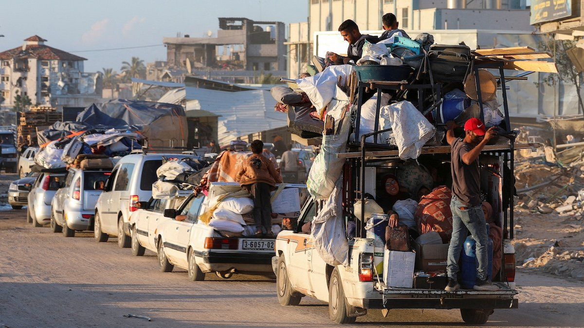 ​Displaced Palestinians, who fled Rafah after the Israeli military began evacuating civilians from the eastern parts of the southern Gazan city, ahead of a threatened assault, amid the ongoing conflict between Israel and Hamas, travel on a vehicle, in Khan Younis in the southern Gaza Strip May 6, 2024. 