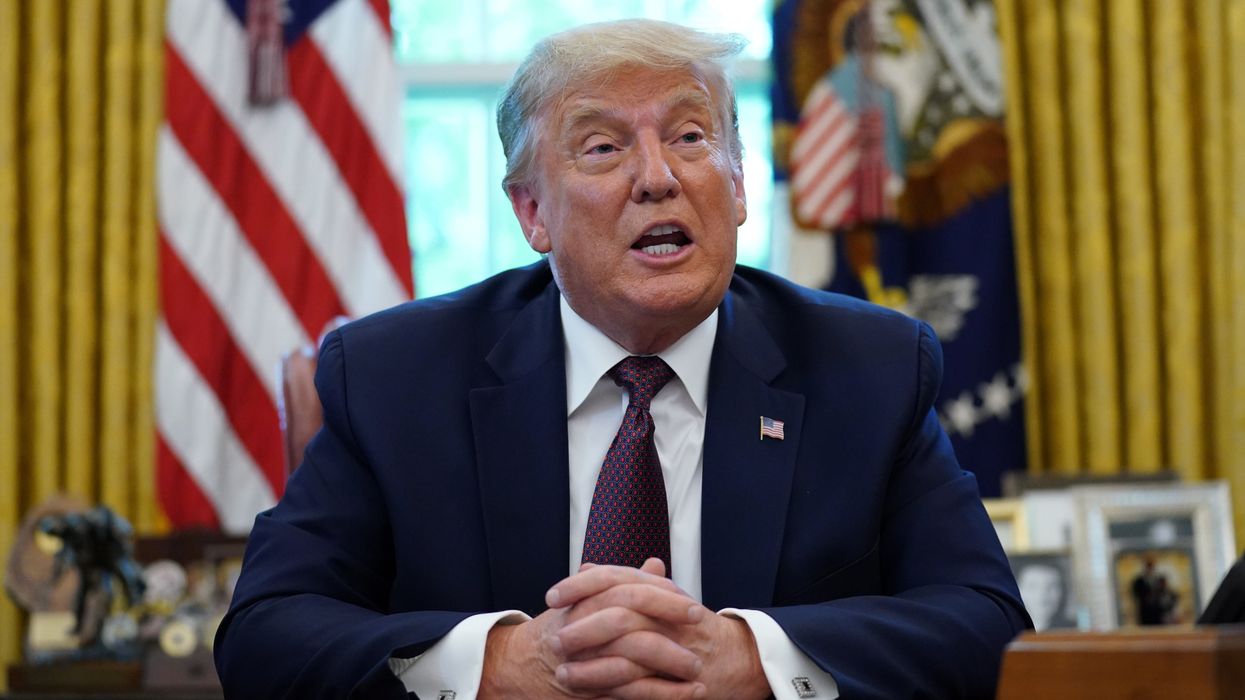 Donald Trump issues a proclamation from the Oval Office