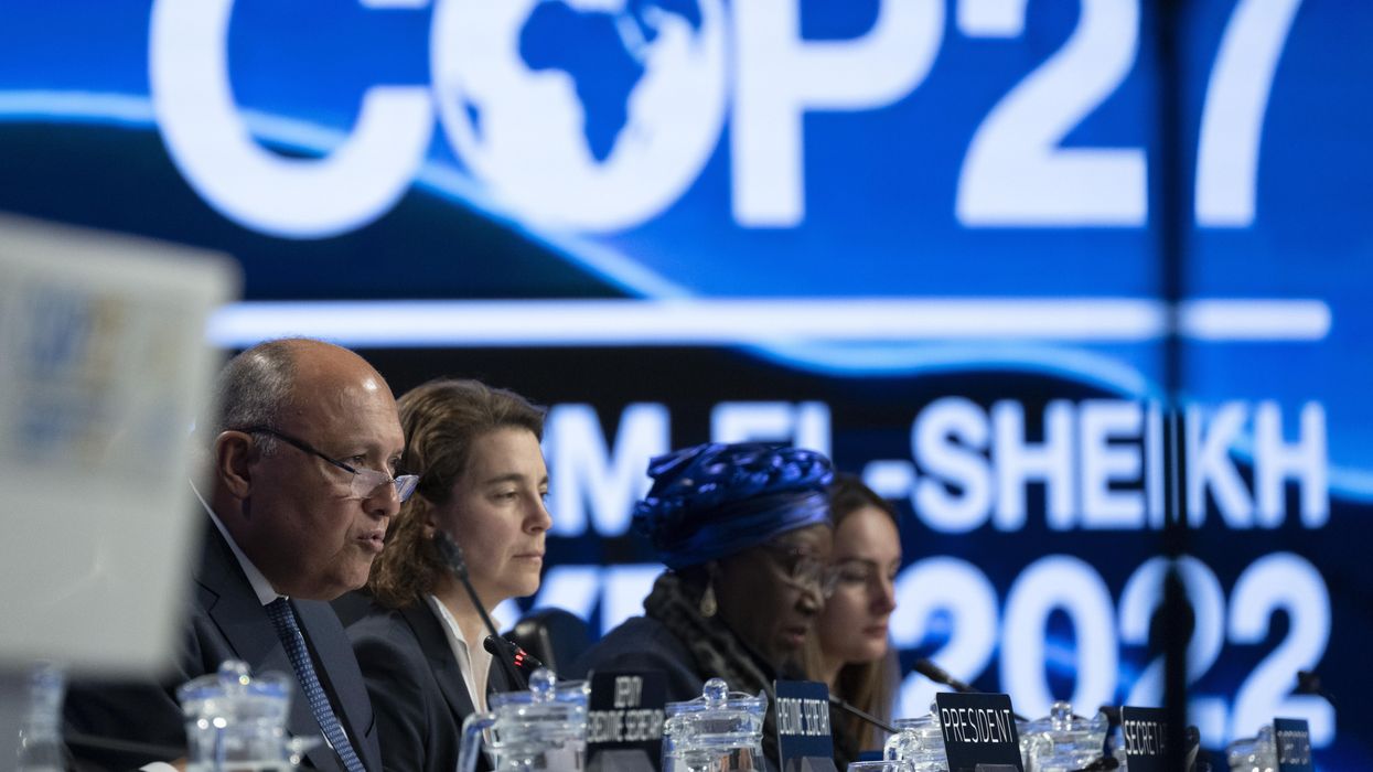Egypt's Foreign Minister Samih Zhukri (l) speaks during the closing ceremony at the COP27 climate summit in Sharm el-Sheikh.