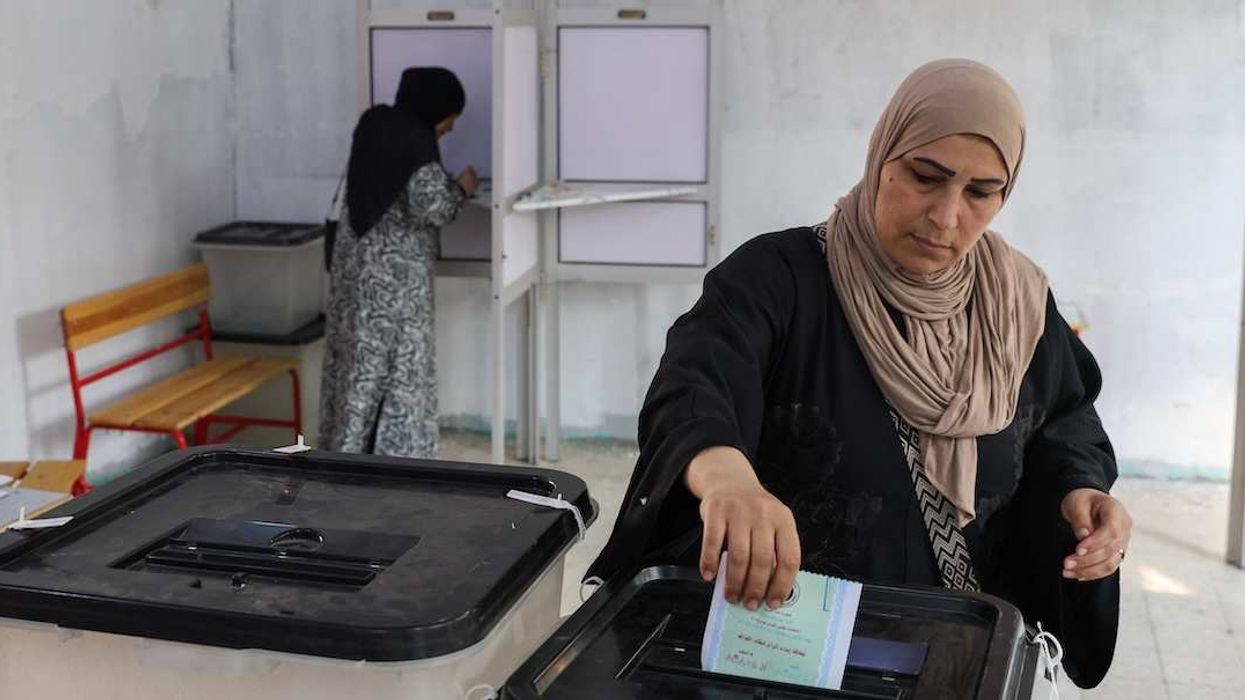 Egyptians head to the polls to elect a new parliament during the first round of the Egyptian parliamentary elections in Giza, Egypt, on November 10, 2025.