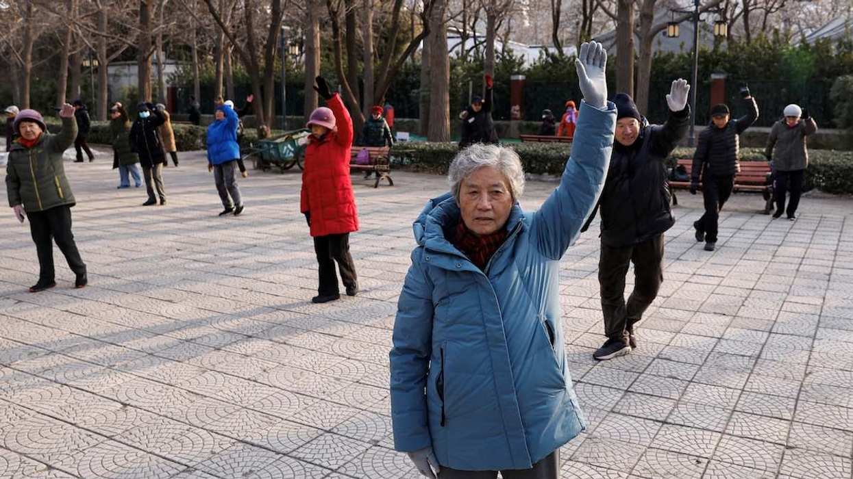 Elderly people dance at a park in Beijing, China January 16, 2024.