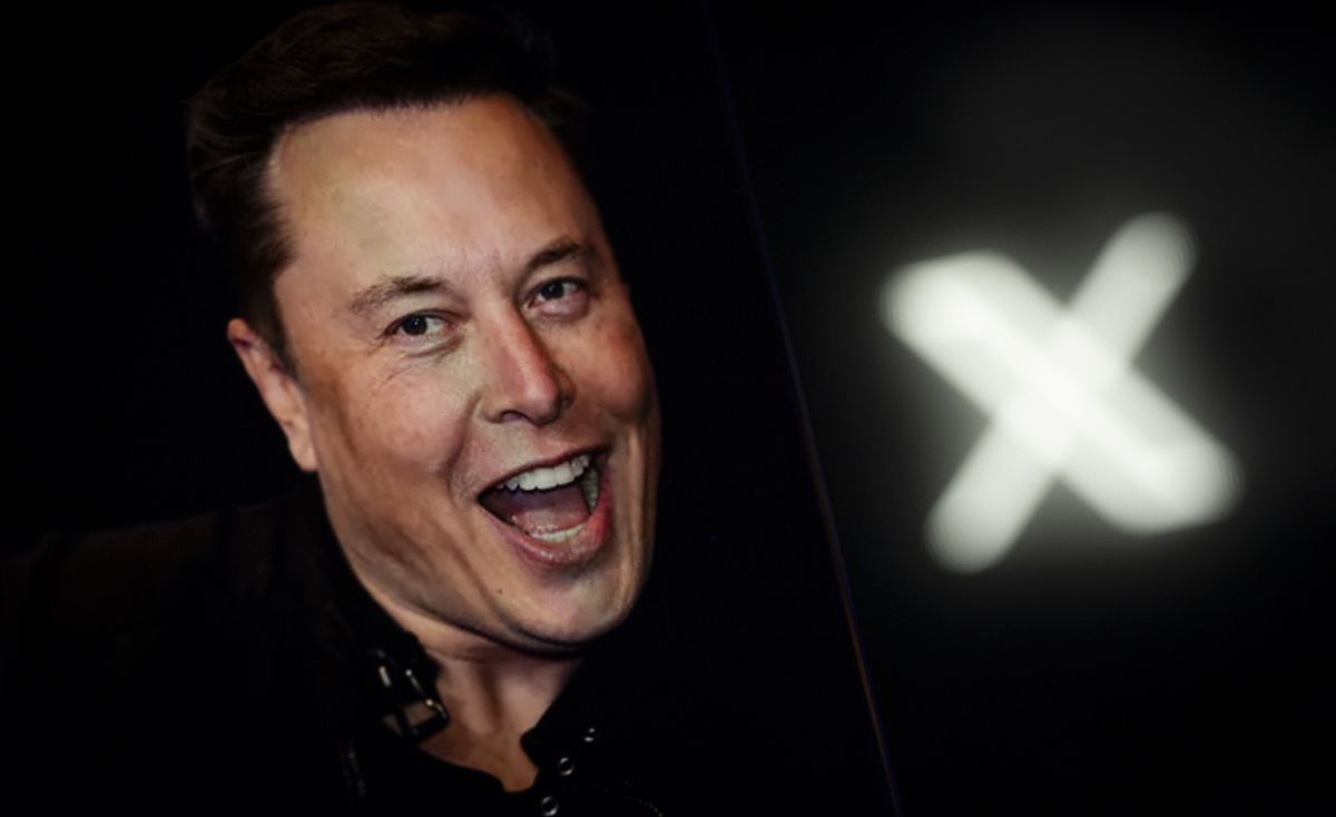 Elon Musk is seen displayed on a mobile device with the Twitter and X logos in the illustration. 