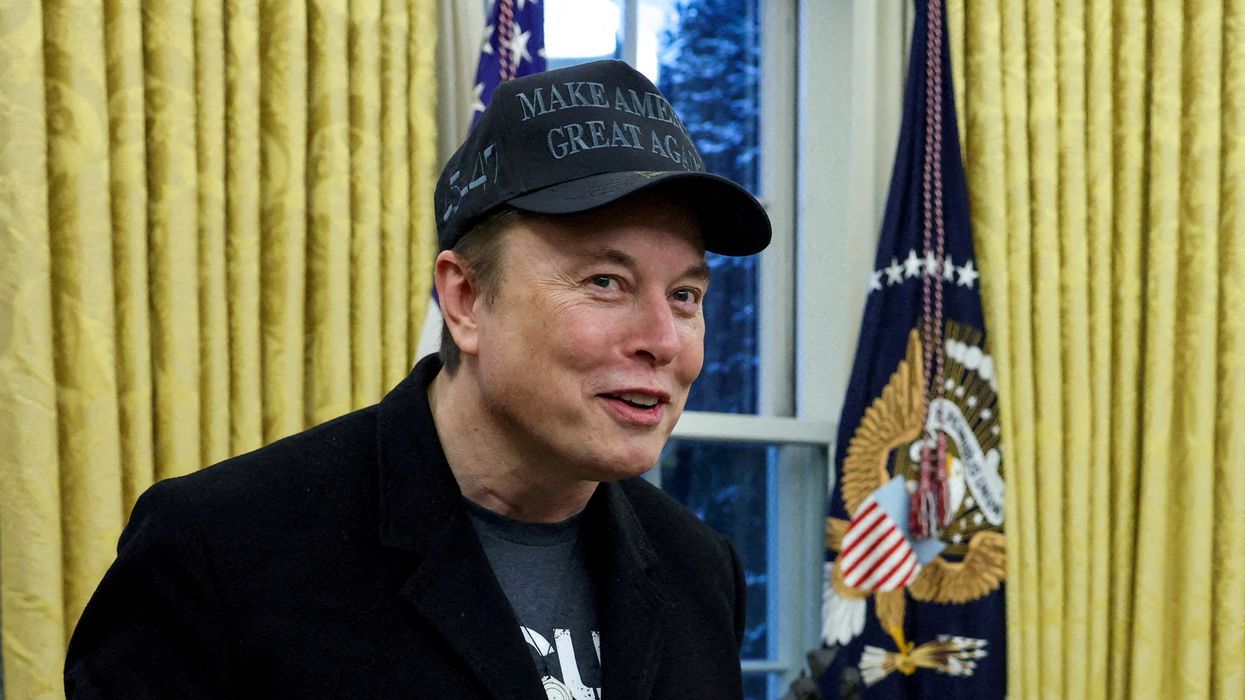 Elon Musk speaks next to U.S. President Donald Trump (not pictured) in the Oval Office of the White House in Washington, D.C., U.S., February 11, 2025.