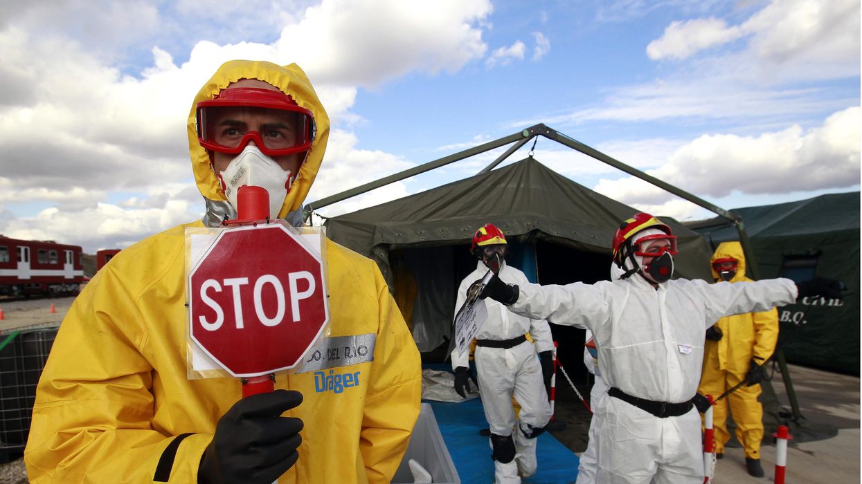 Emergency workers during an emergency response drill to simulate the aftermath of a dirty bomb explosion outside Madrid.