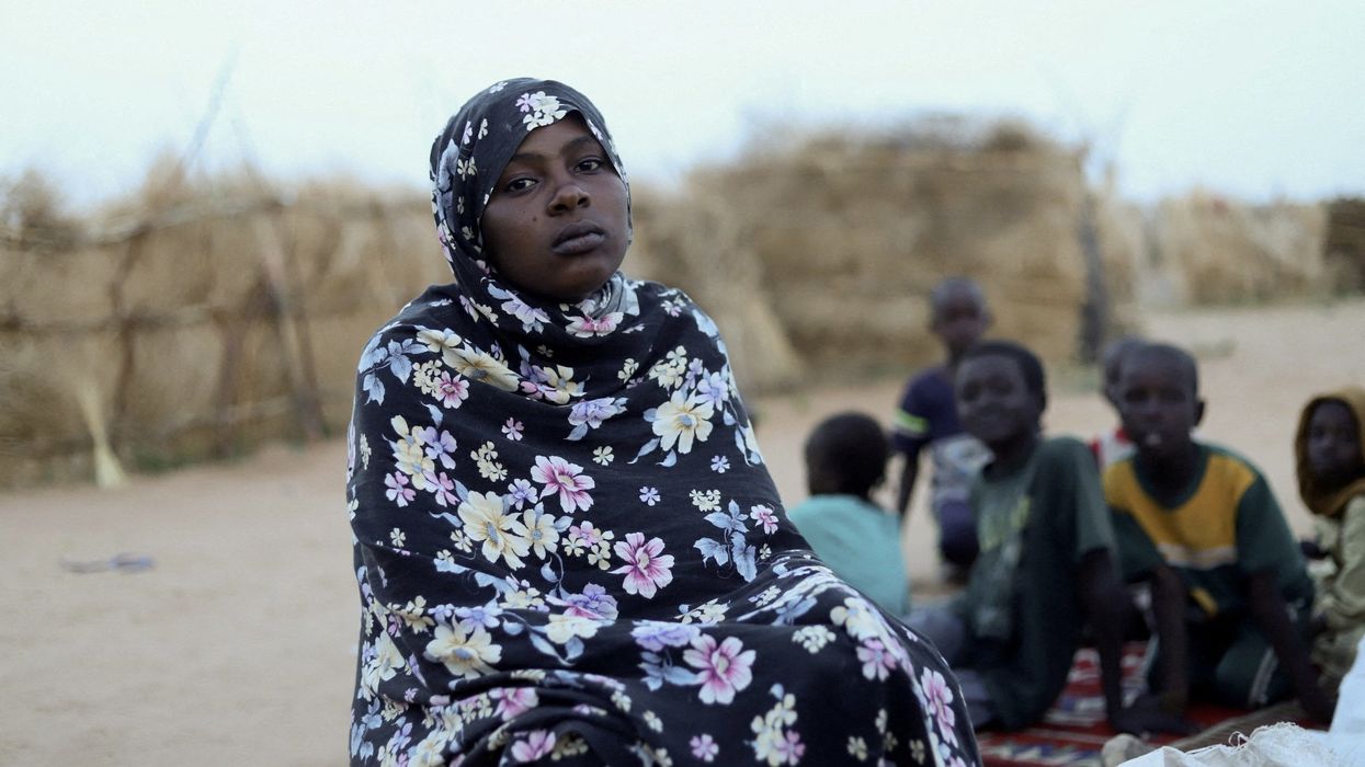 Enaam Abdallah Mohammed, 19, a displaced Sudanese woman and mother of four, who fled with her family, looks on inside a camp shelter amid the ongoing conflict between the paramilitary Rapid Support Forces (RSF) and the Sudanese army, in Tawila, North Darfur, Sudan July 30, 2025.