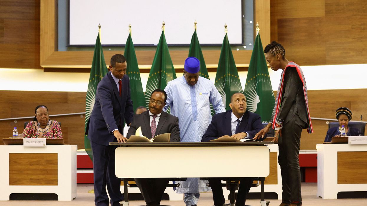 Ethiopian government representative Redwan Hussien and Tigray delegate Getachew Reda attend signing of the AU-led negotiations to resolve the conflict in northern Ethiopia.
