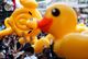 Pro-demonstrators carry inflatable rubber ducks during a rally in Bangkok. Reuters