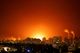 A large fire is seen near the scene of what officials said was a Gaza rocket attack on an Israeli energy pipeline near Ashkelon, Israel, May 11, 2021.