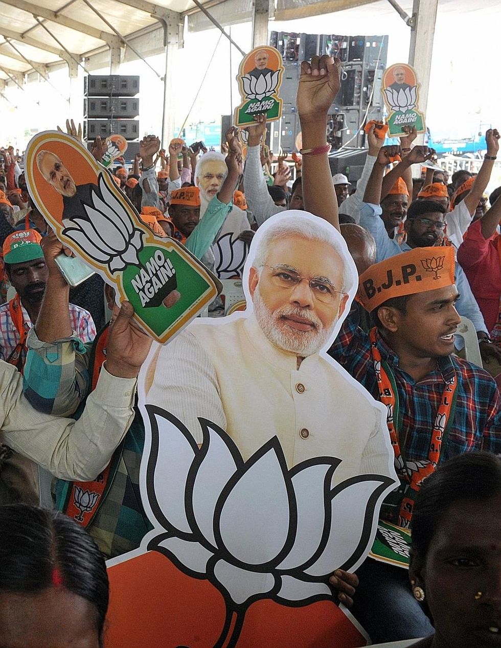Opinion polls point to narrow win for BJP coalition