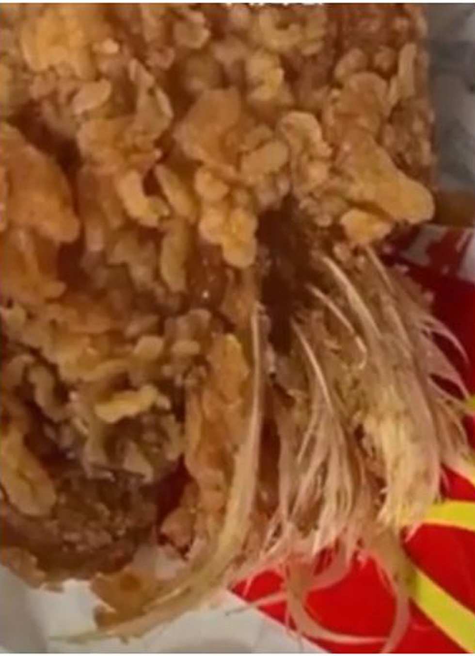 Beijing girl finds feathers in chicken meal from McDonald's
