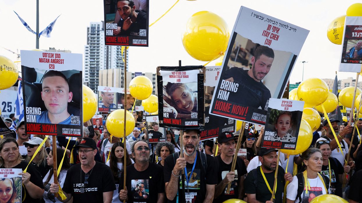 Family members, friends, and supporters of Israelis taken hostage on Oct. 7 by Hamas marched from Tel Aviv to Jerusalem. They're seen here in Jerusalem on Nov. 18, 2023.