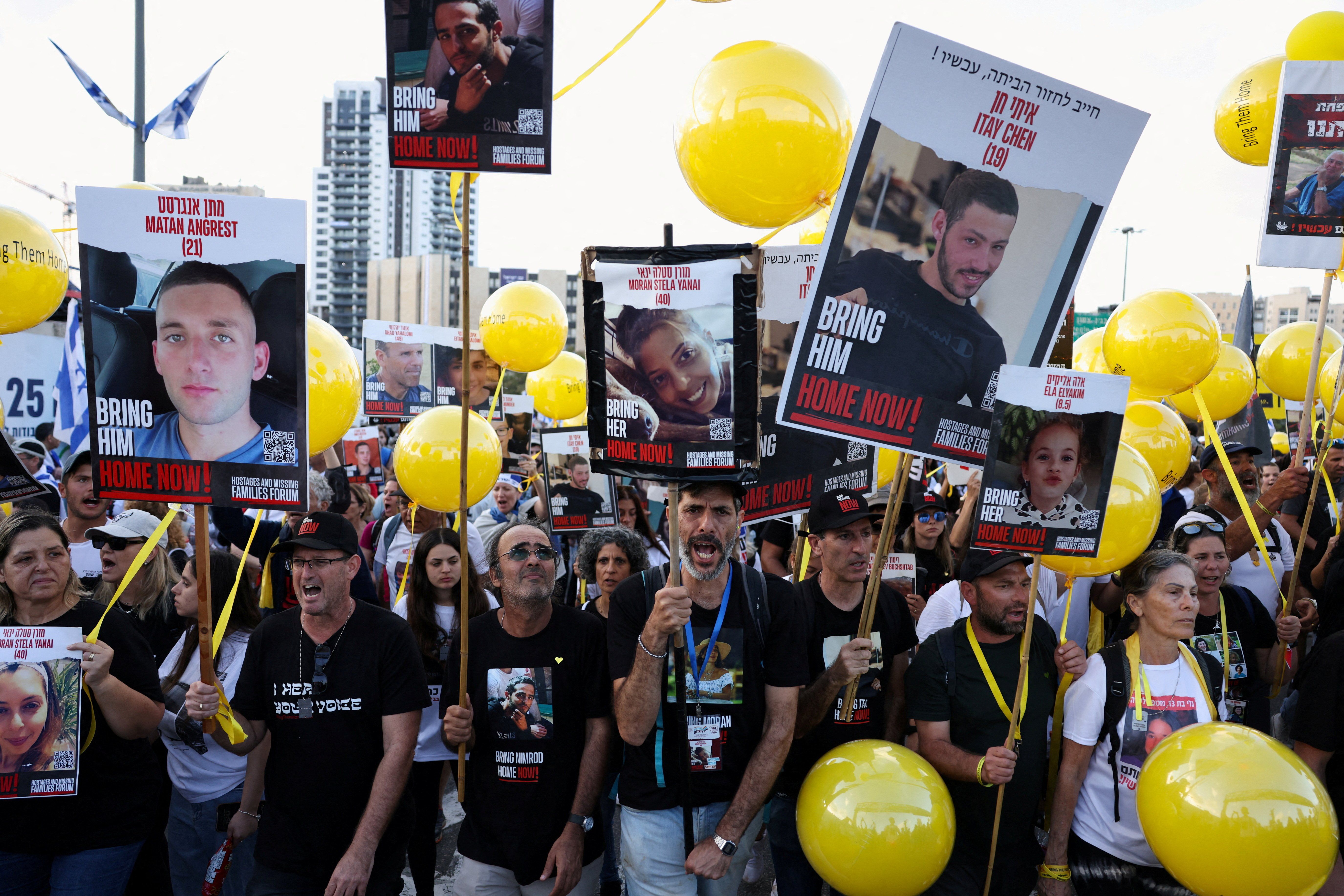 Family members, friends, and supporters of Israelis taken hostage on Oct. 7 by Hamas marched from Tel Aviv to Jerusalem. They're seen here in Jerusalem on Nov. 18, 2023.