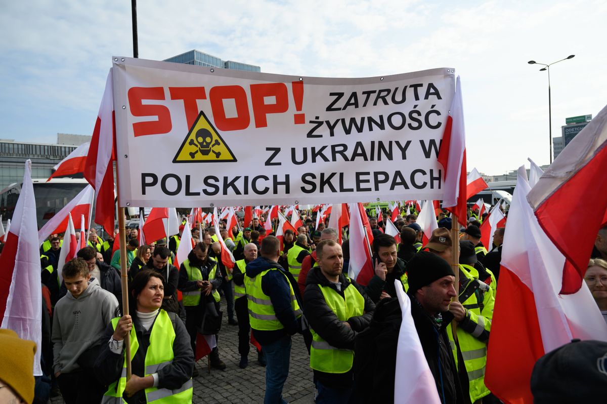 Farmers Gather To Protest In Warsaw. Polish farmers hold a banner that reads Stop poisoned food from Ukraine in Polish shops in Warsaw, Poland, on February 27, 2024.