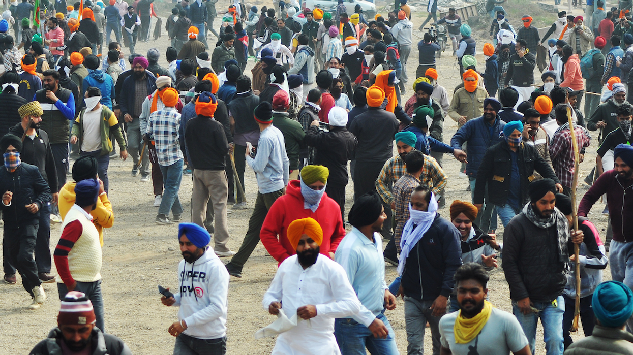 Farmers stage a Delhi Chalo march over various demands, at the Punjab-Haryana Shambhu border, near Ambala on Tuesday.
