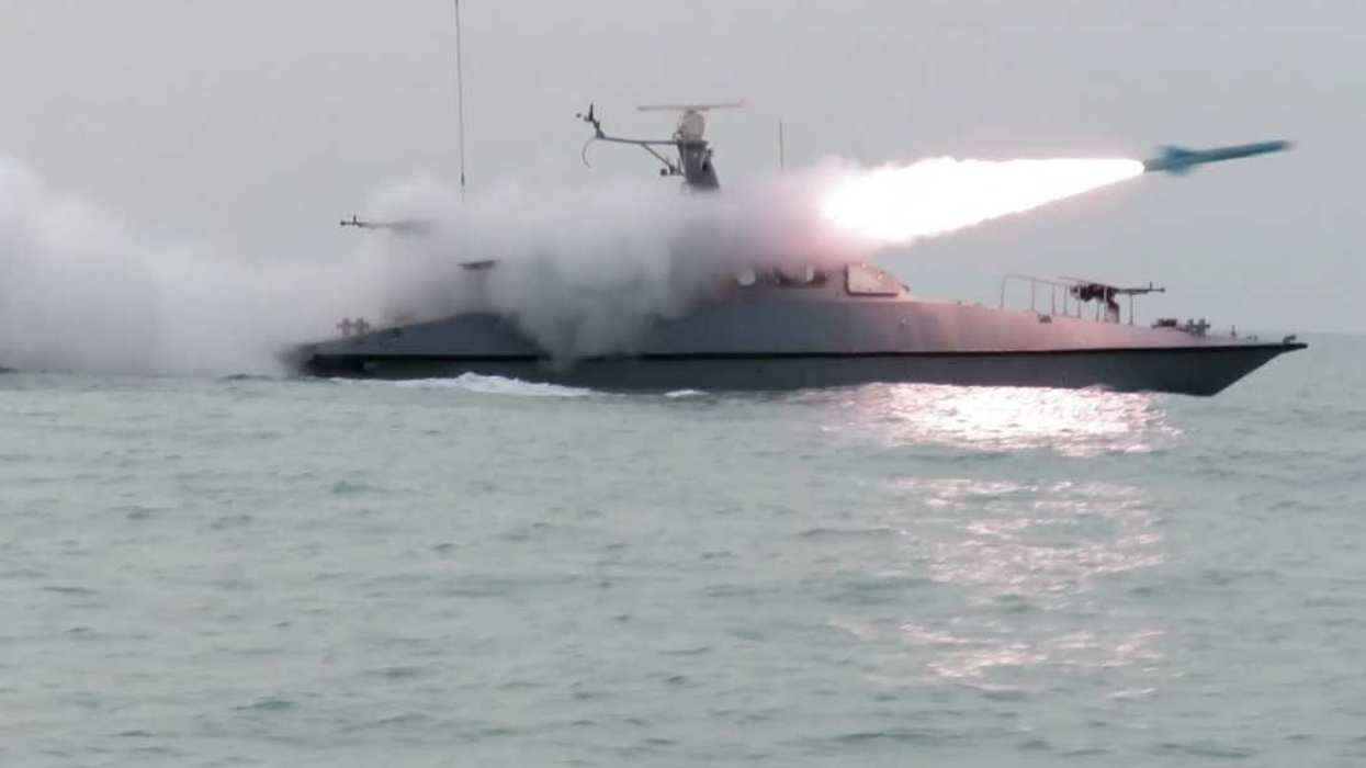 February 16, 2026, Strait Of Hormuz, Persian Gulf, Iran: A boat firing a missile during a military drill in the Persian Gulf, southern Iran.