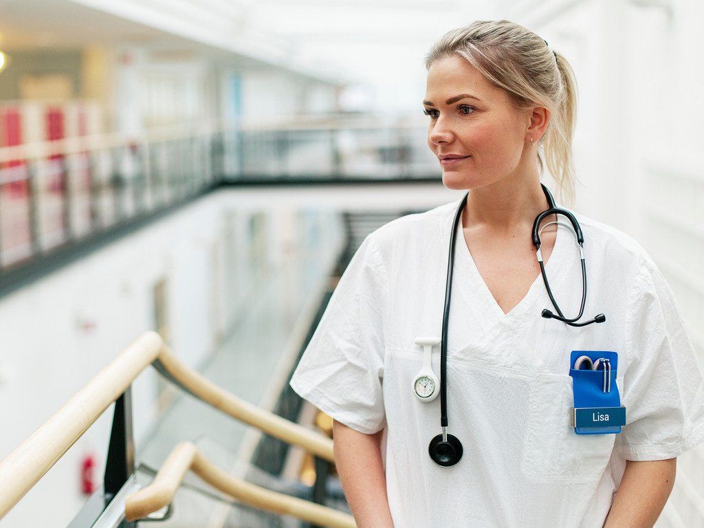 Female doctor in hospital setting.